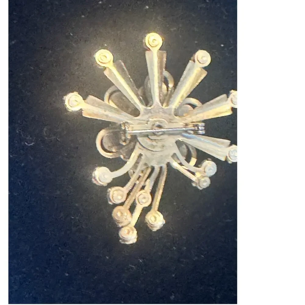 Vintage‎ MCM brooch, gold toned with light blue rhinestones